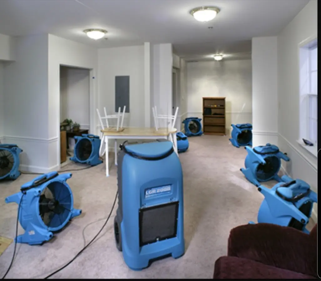Air movers and dehumidifier setup for Water Damage Restoration in Haysville